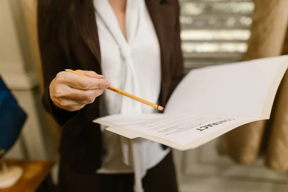 A professional reviewing a commercial contract